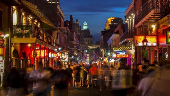 Pedestrian friendly Bourbon Street is lined with clubs and bars in New Orleans, Louisiana.